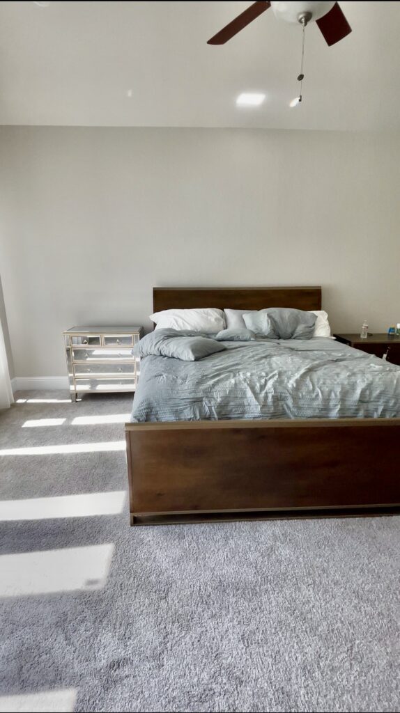 Before of a Primary Bedroom Wall - Builder's grade Sugar Land